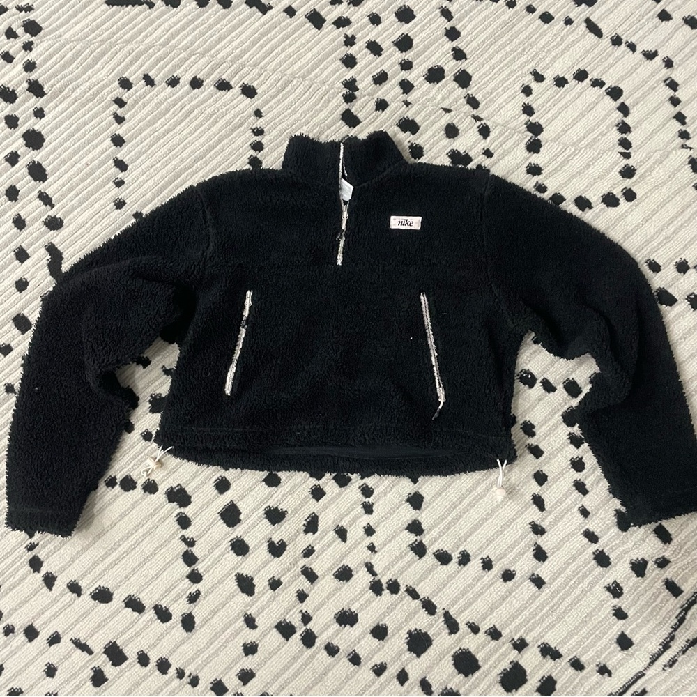 Nike Black Teddy Jacket with High Collar and Zip-Up Closure